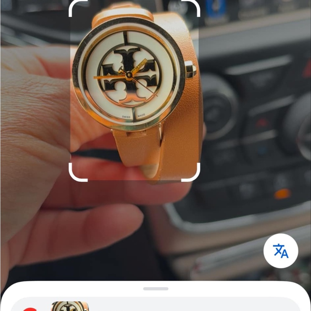 Tory Burch Gold Wearable Watch.